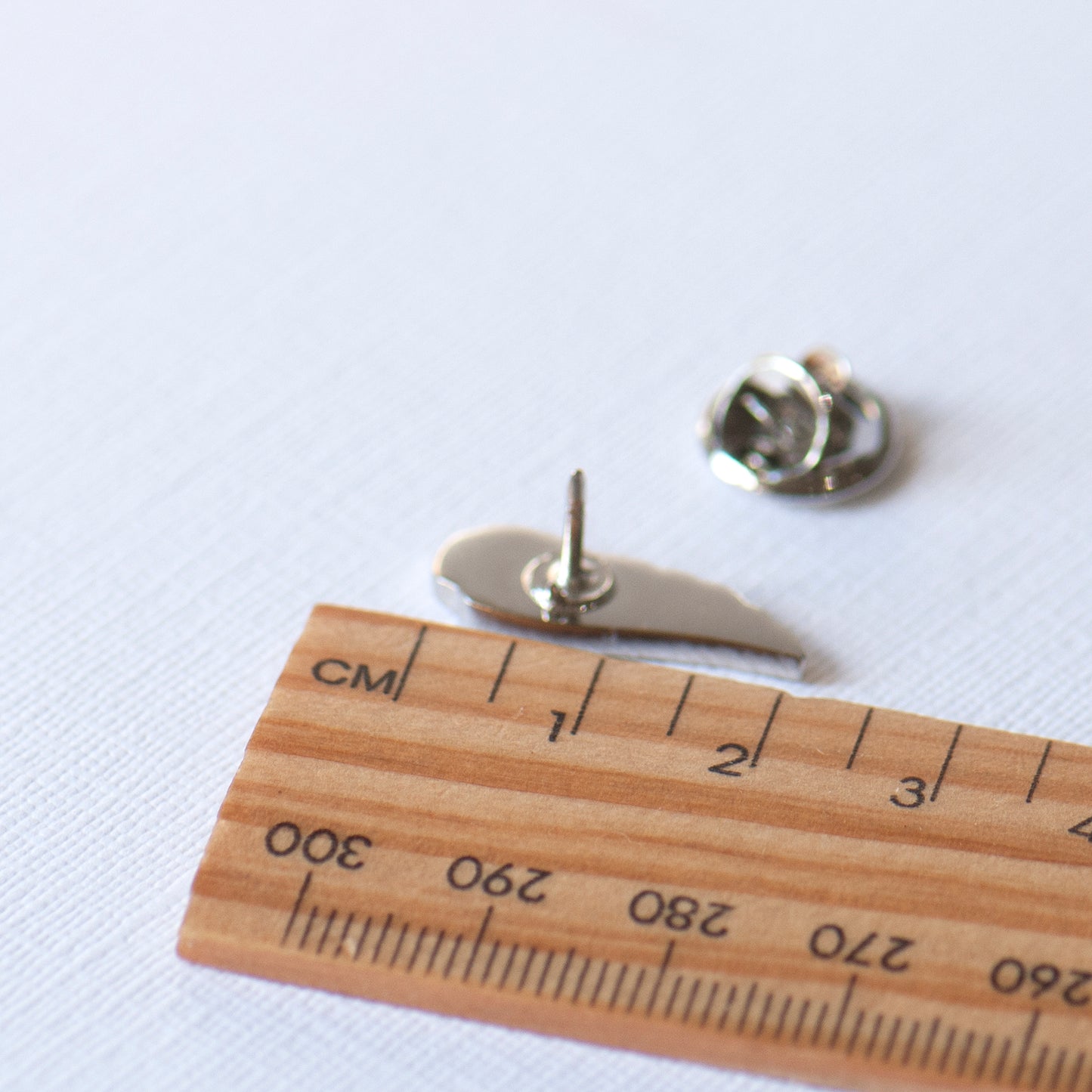 Silver angel wing memorial pin