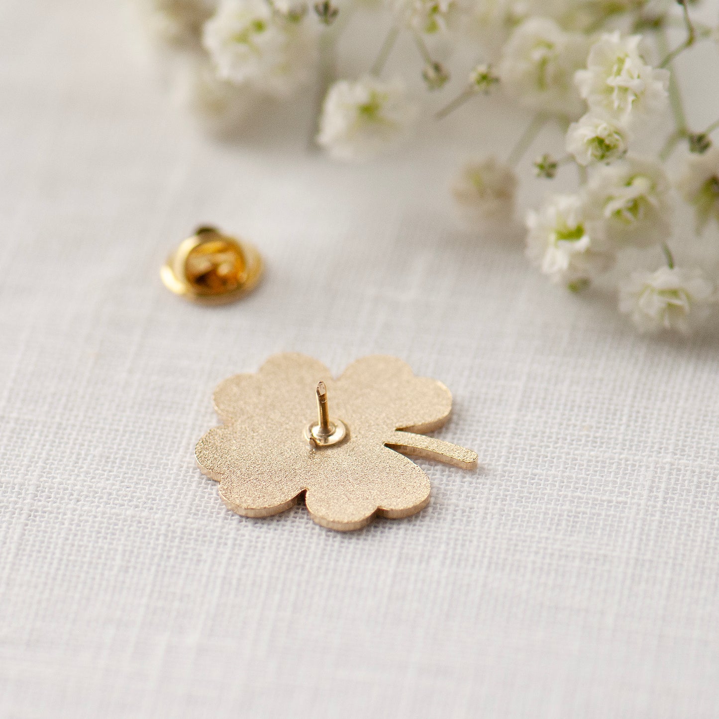 Back image of the good luck enamel clover pin