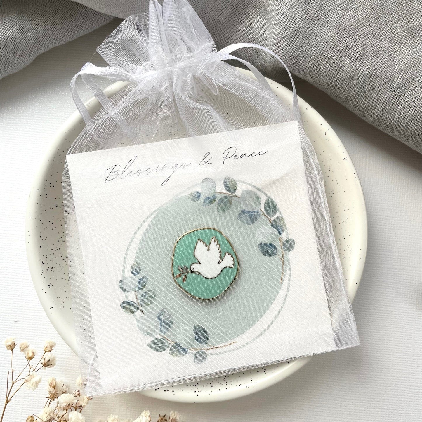 Dove of peace enamel pin on my bespoke gift card and packaged in a sweet chiffon pouch ready for gifting