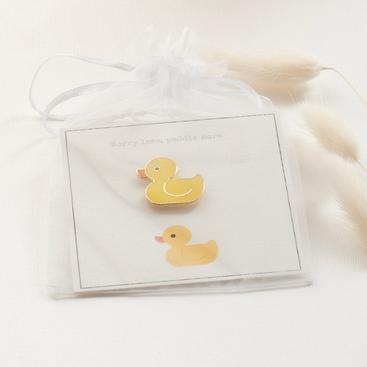 Duck enamel pin on bespoke gift card - worry less, paddle more, in chiffon pouch ready for gifting