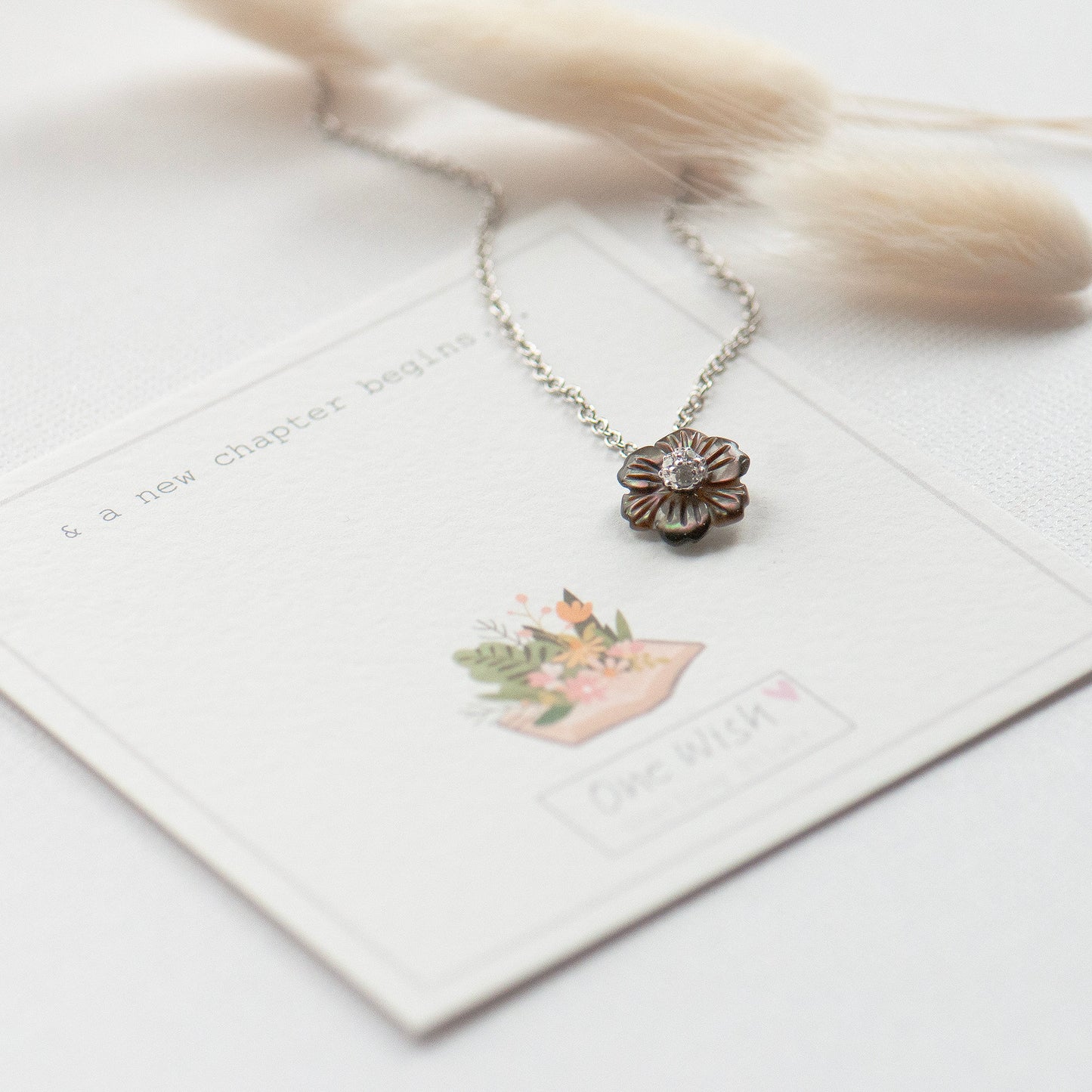 Flower pendant on my ' and a new chapter begins giftcard' designed by Rachel - Grace & Valour, perfect for new job gift, new beginnings gift, new baby gift, moving house gift