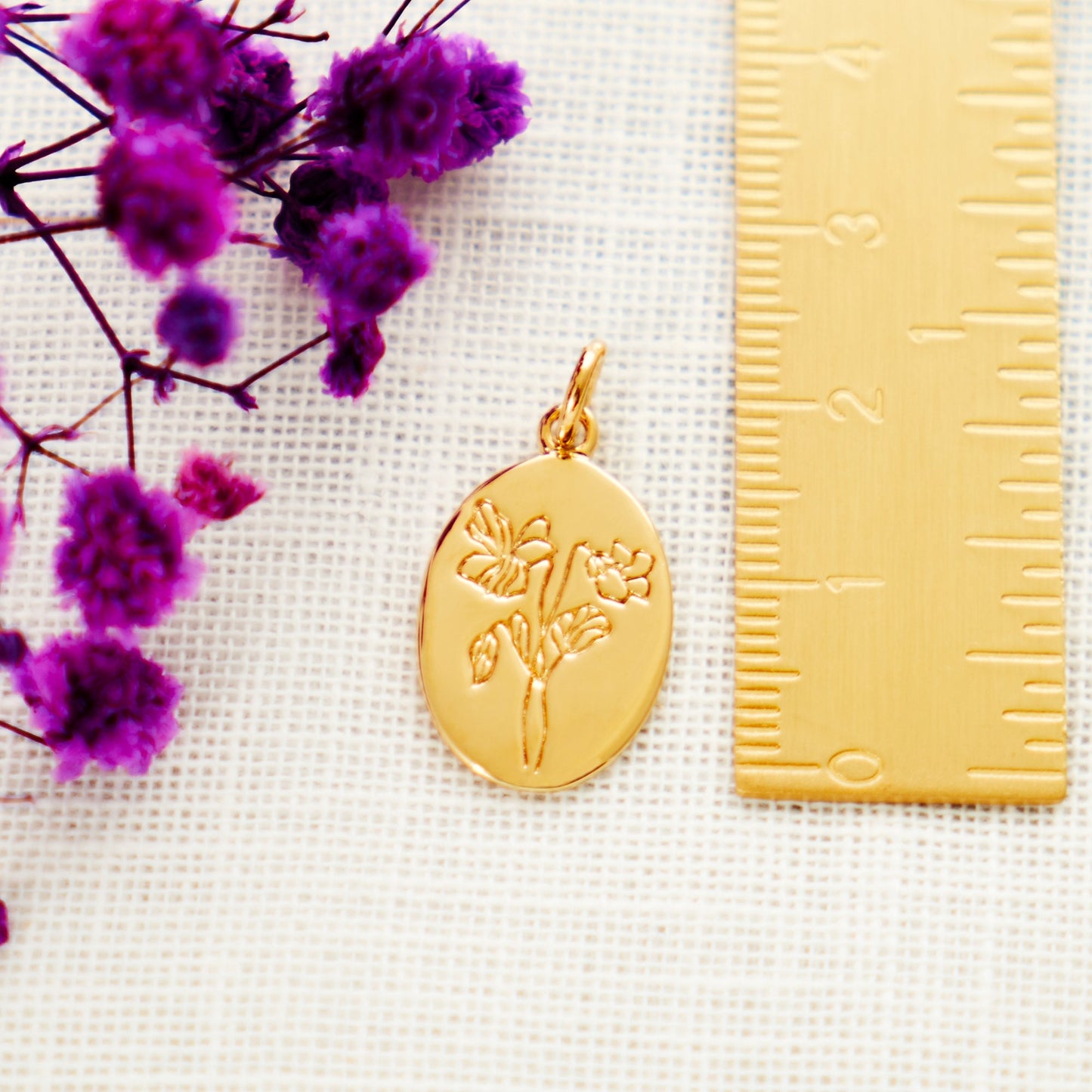 Gold engraved violet flower pendant
