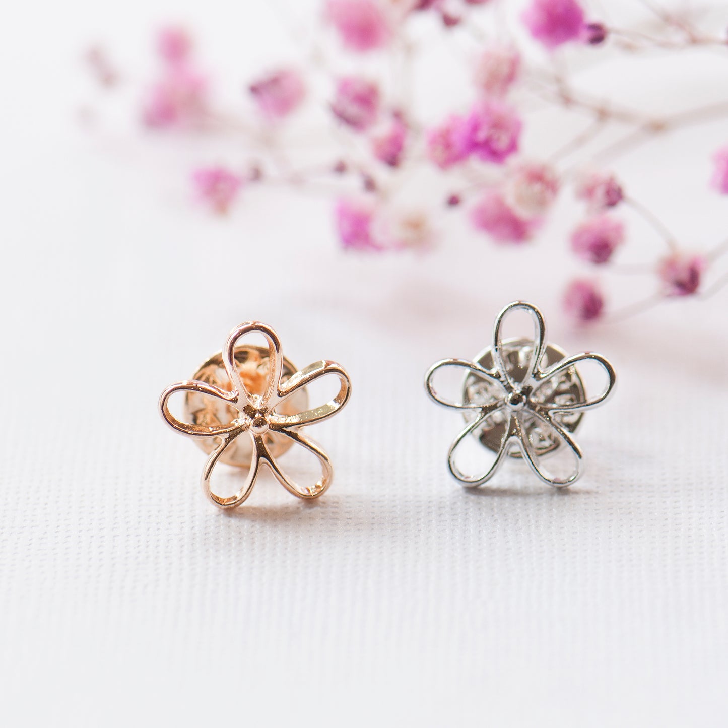 Gold or silver modesty pins, made from metal, extra button pins