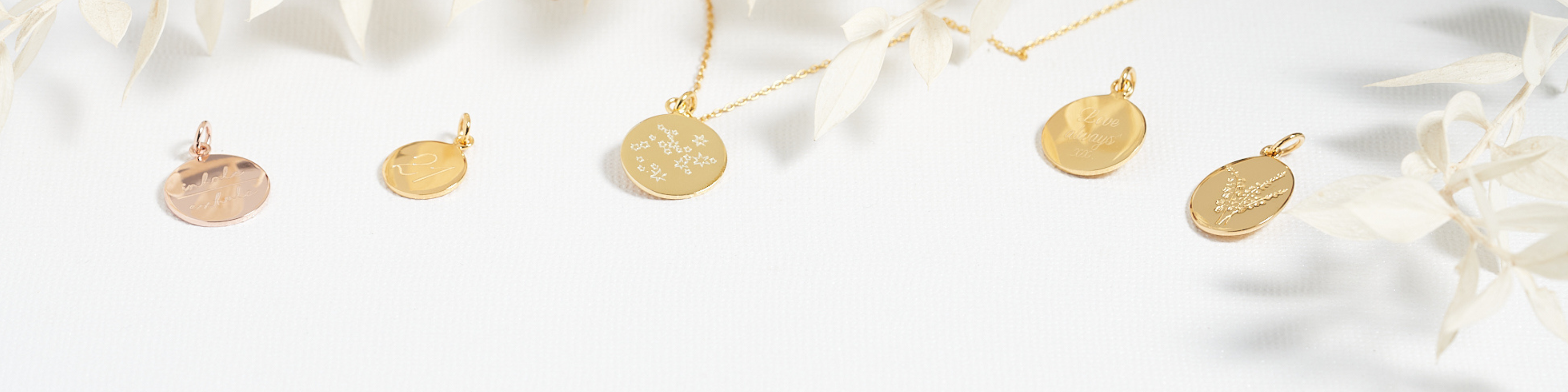 Welcome Grace and Valour gold engraved necklaces available in store