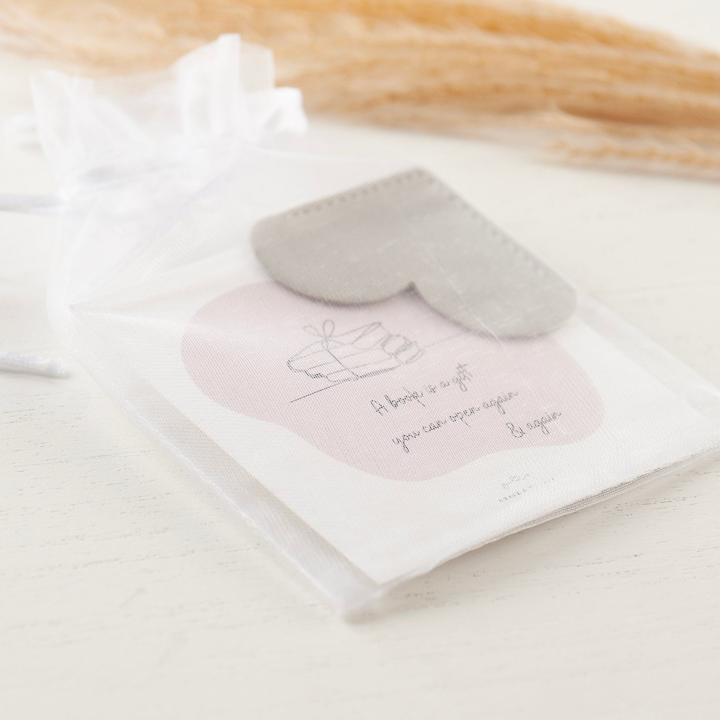 Grey heart shaped bookmark on bespoke gift card which reads 'A book is a gift you can open again and again' Packaged in my white chiffon gift pouches ready for gifting. Gifts under £10