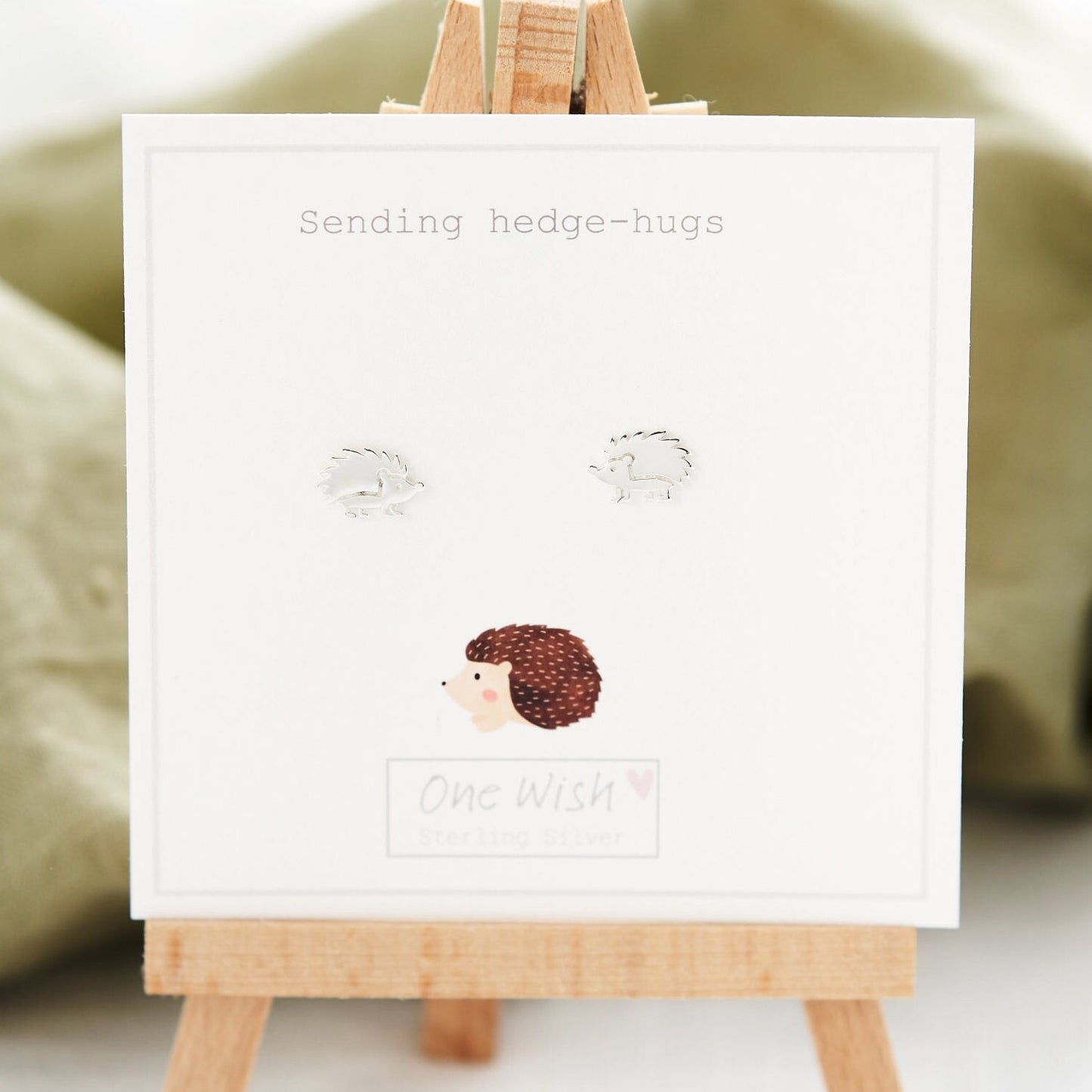Hedgehog Sterling Silver Stud Earrings on Bespoke gift card which says 'Sending hedge-hugs'
