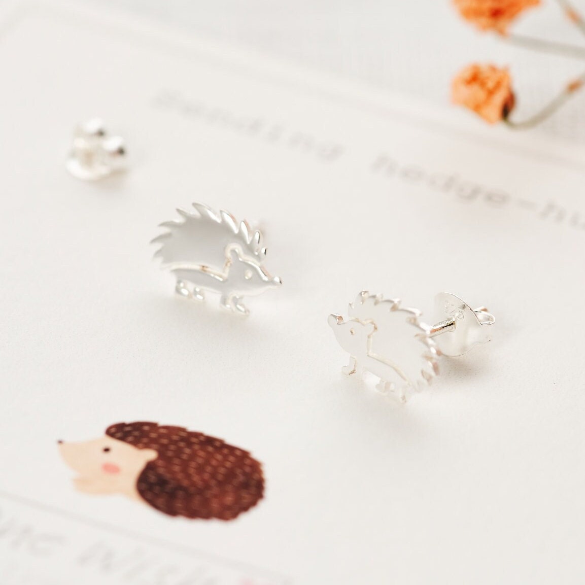 Hedgehog Sterling Silver Stud Earrings on Bespoke gift card which says 'Sending you hedge-hugs'