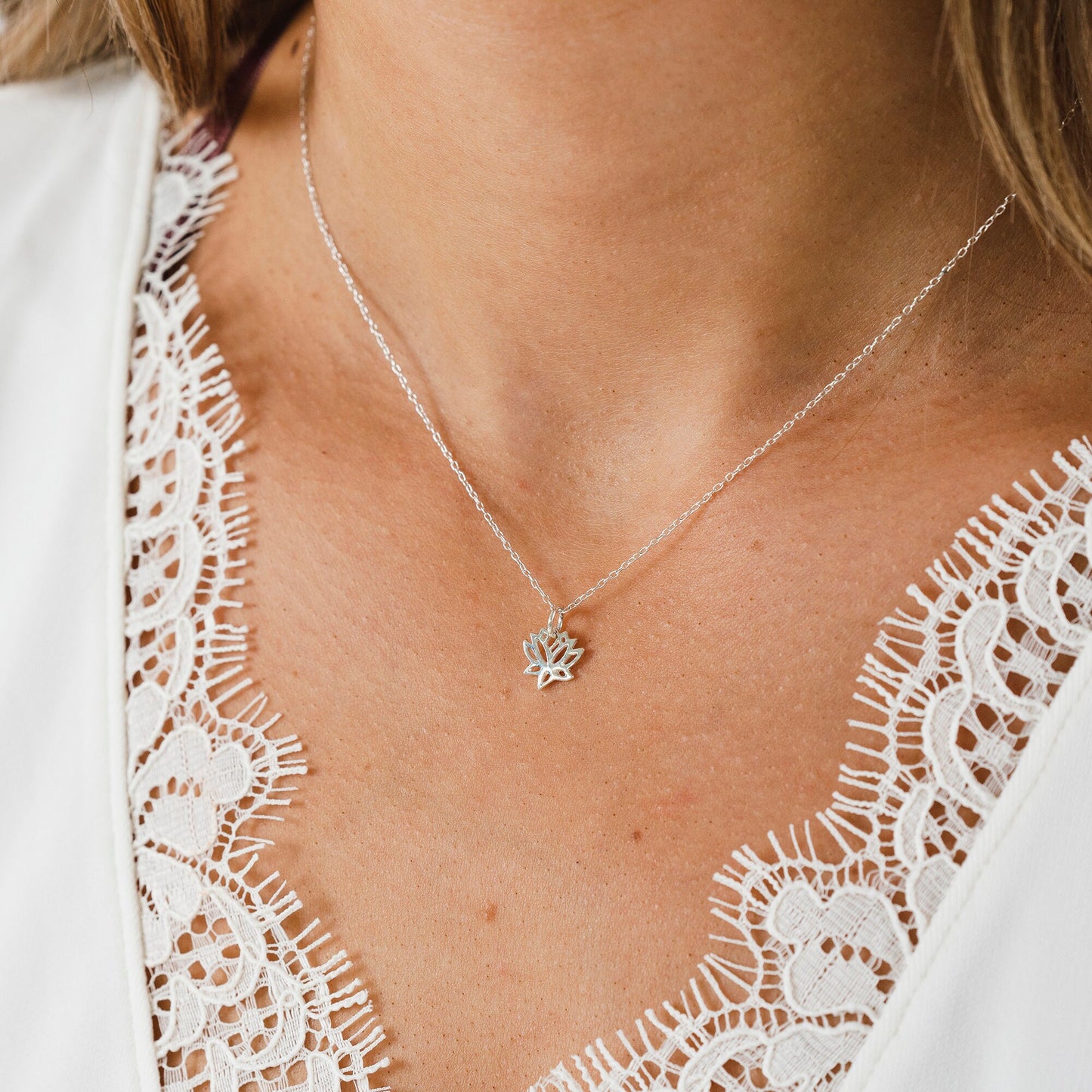 Lotus flower little Sterling Silver necklace on model. Gift for her, gift for traveller, gift for yoga lover, gift for positive mental health. Silver 925 flower lotus pendant, gift for friend