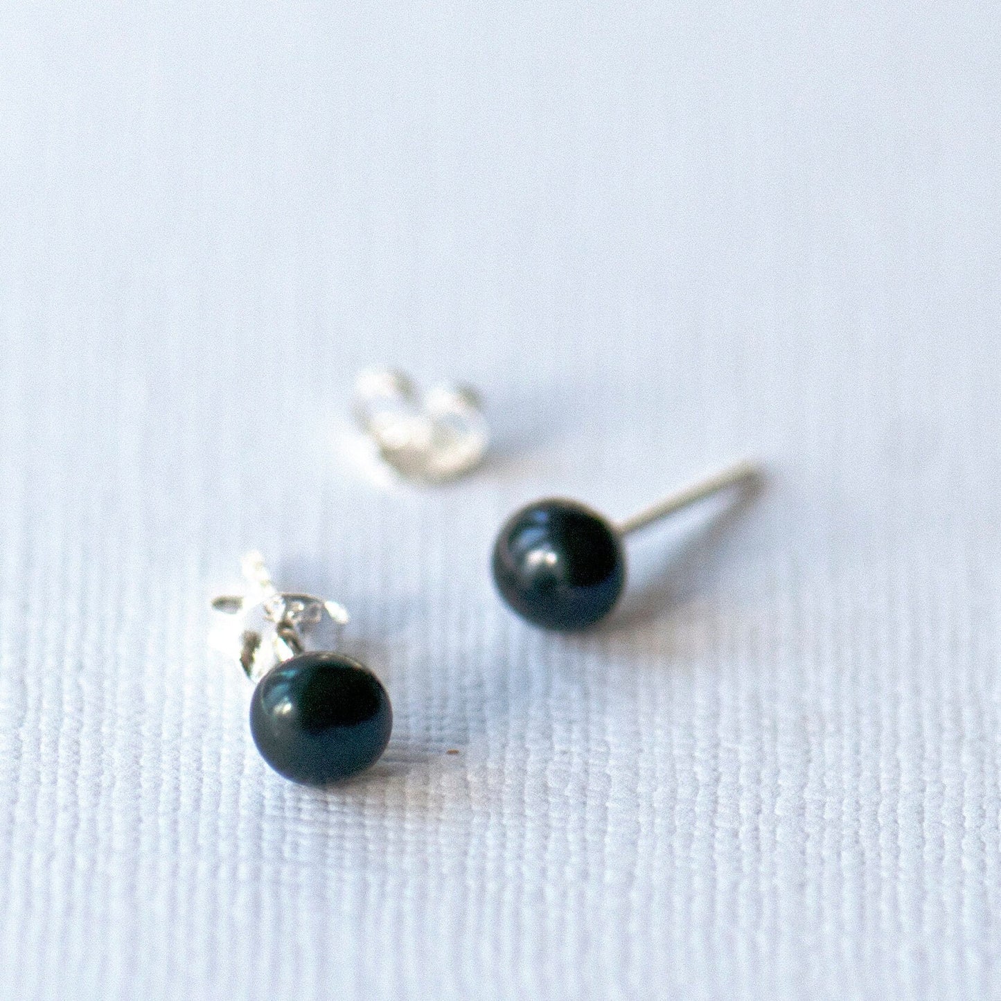 Sterling silver 925 and black pearl stud earrings - Grace & Valour. Simple classic stud earrings, the perfect gift for a friend, neighbour or loved one. Cute pearl stud earrings with sterling silver posts