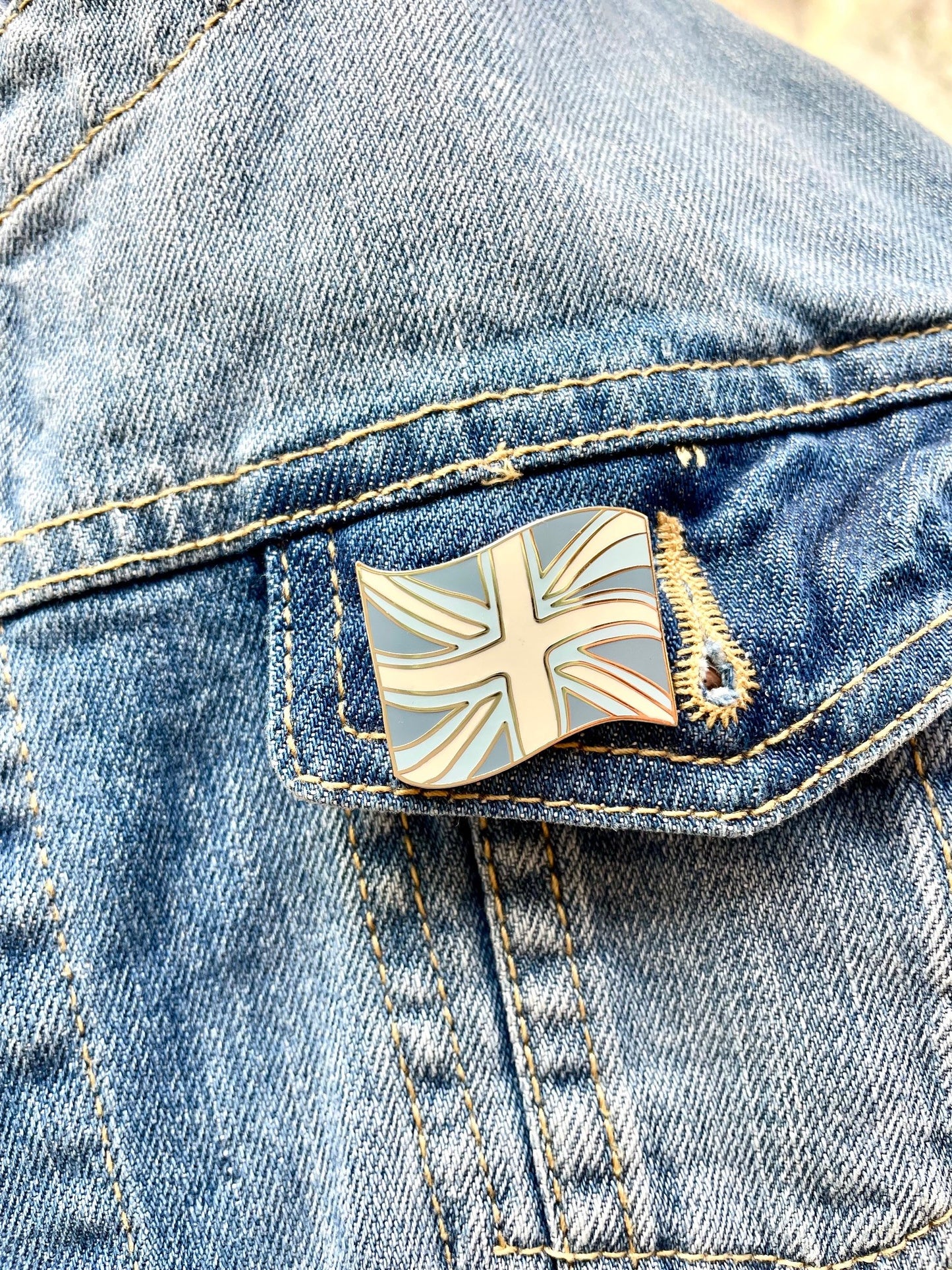 Union flag in soft coastal colours on denim jacket pocket