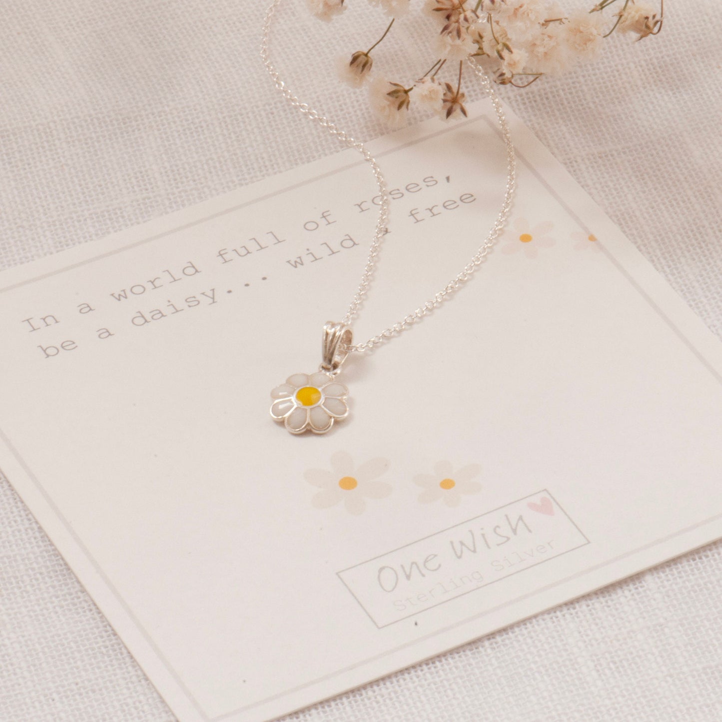 White daisy sterling silver necklace on bespoke gift card 'In a world of roses, be a daisy, wild and free' Gift for friend, cute flower necklace, jewellery designed by Grace and Valour in Stamford
