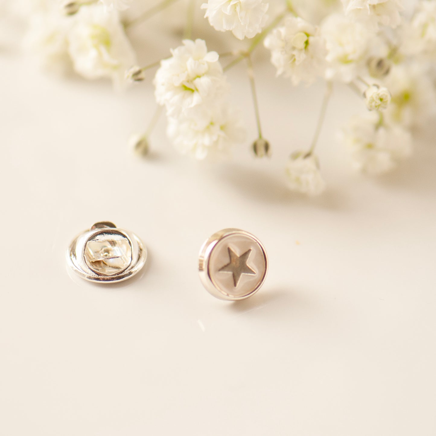 White and silver star enamel pin, grace and valour