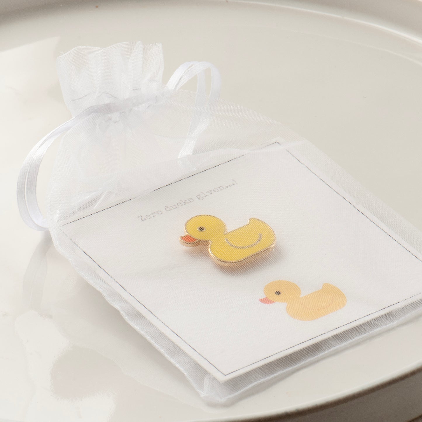 Zero ducks given enamel duck pin on gift card and packaged sweetly in our chiffon gift pouch ready for gifting