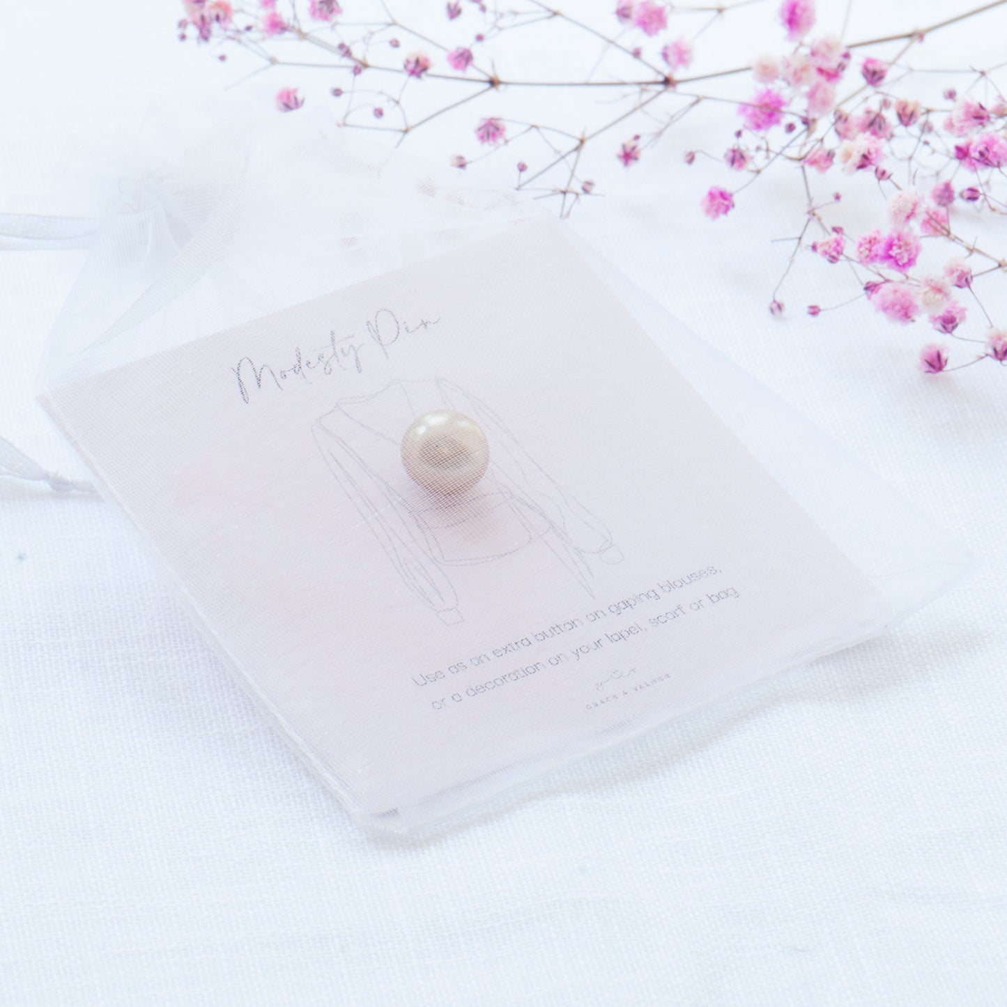 Champagne colour faux pearl modesty pin, extra button pin for a low cut blouse or wrap top. Gift for friend, gift for mum, gift for sister