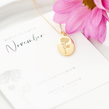 Chrysanthemum birth flower for November engraved gold oval necklace on bespoke November gift card