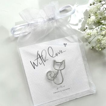 silver cat brooch on gift card inside chiffon pouch packaging