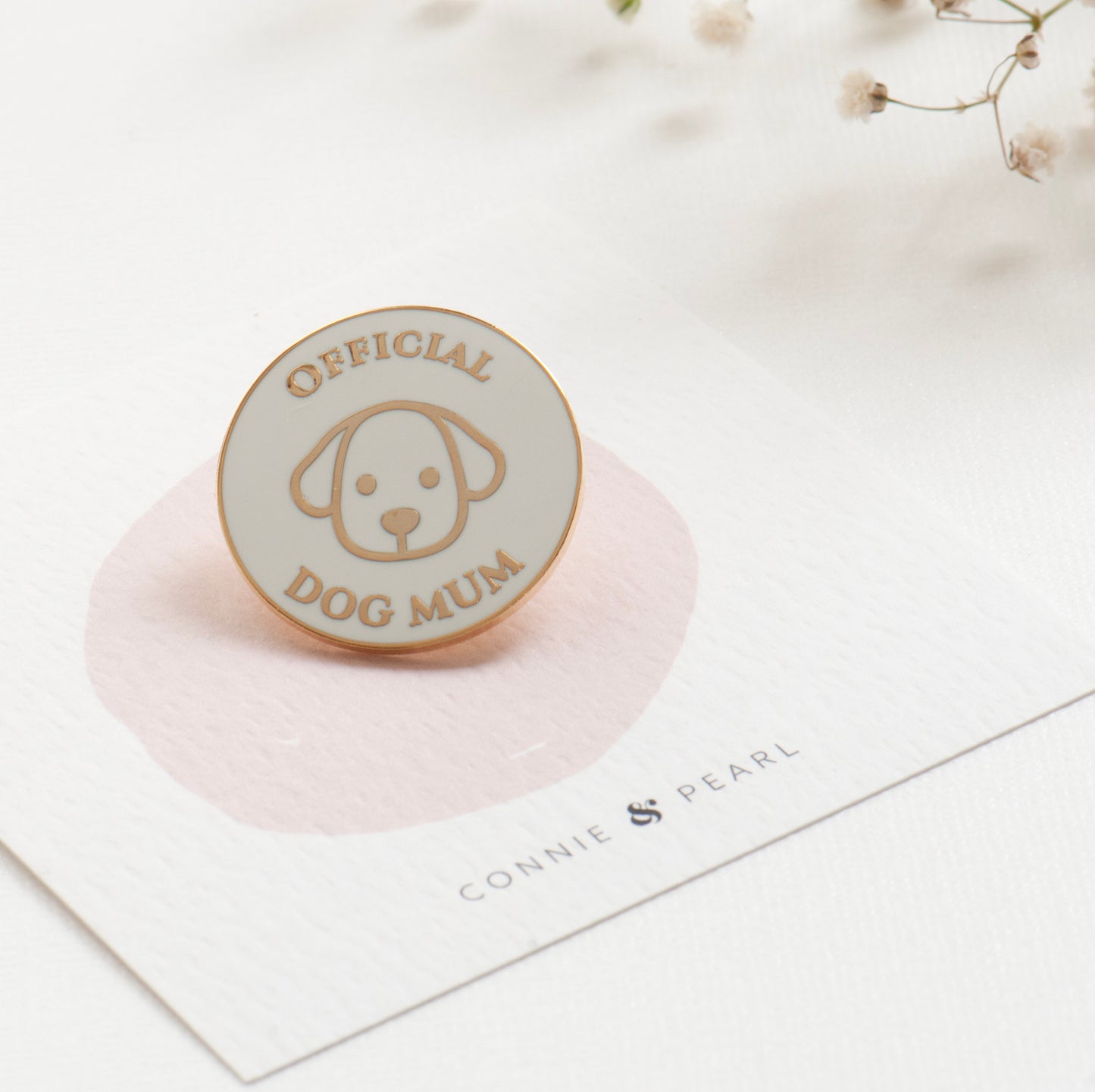 official dog mum lapel pin made from enamel and gold detailing, a quality pin, gifts under £10, dog mum gift, dog lover gift.