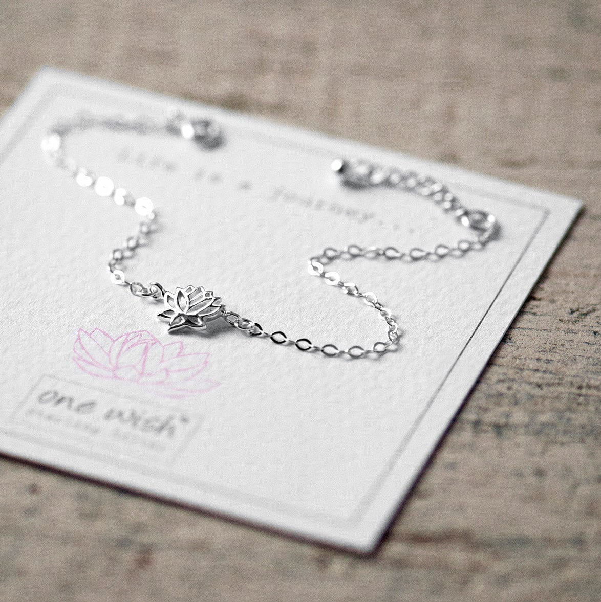 Dainty lotus flower bracelet made from sterling silver 925 on life is a journey bespoke gift card designed by Rachel - Grace and Valour