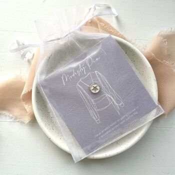 White and silver star enamel pin on my bespoke gift card in chiffon pouch ready for gifting, grace and valour
