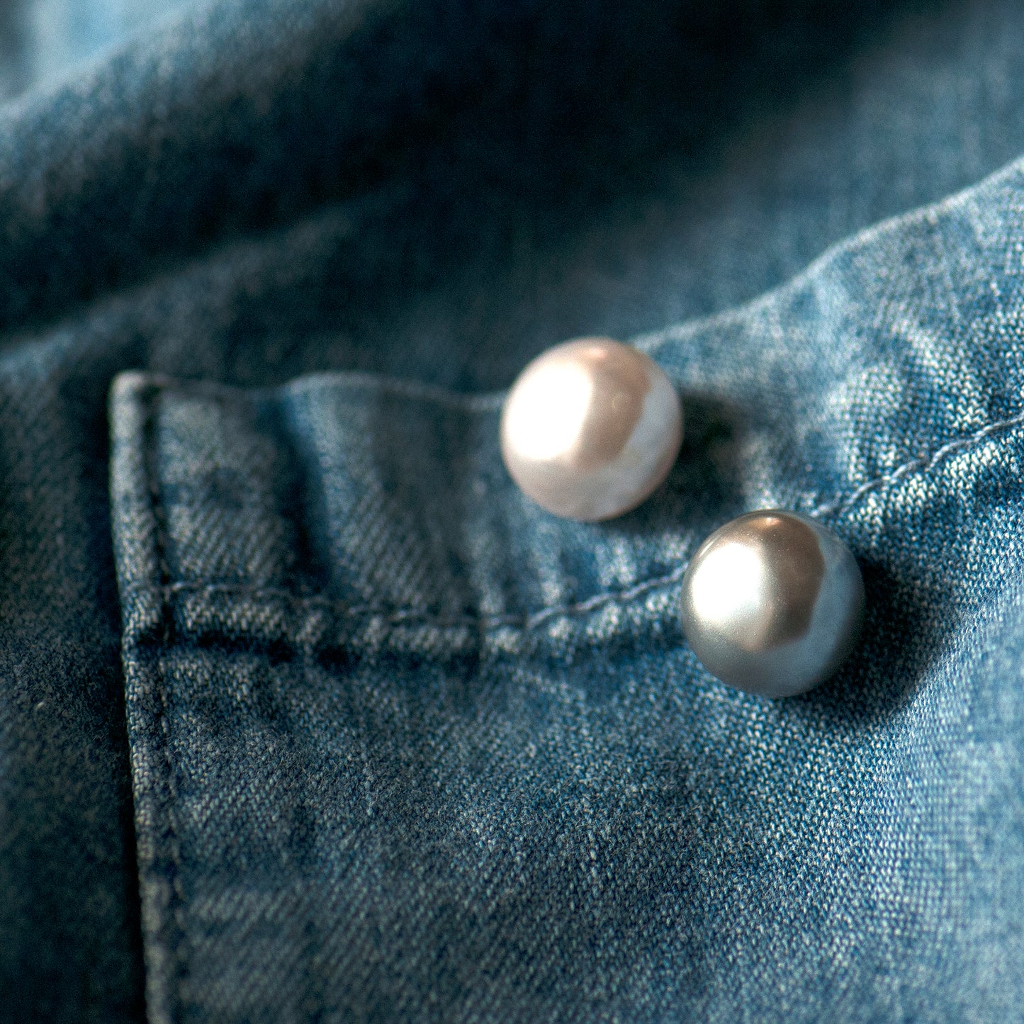 white modesty pin used as a pocket decoration