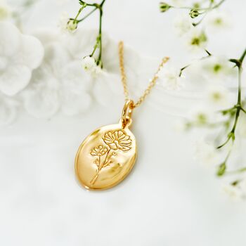 Gold oval necklace engraved with the birthflower for October 