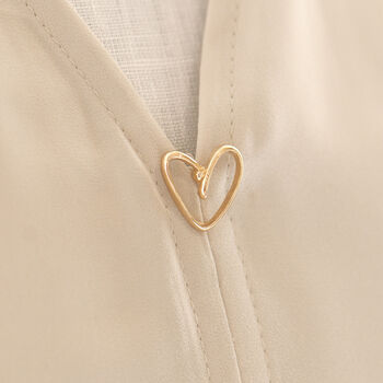 Gold love heart modesty pin, the perfect accessory for low cut tops or when you need an extra button