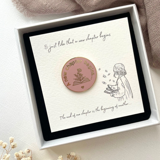 New chapter begins smoke rose and gold enamel lapel pin in my elegant white gift box.