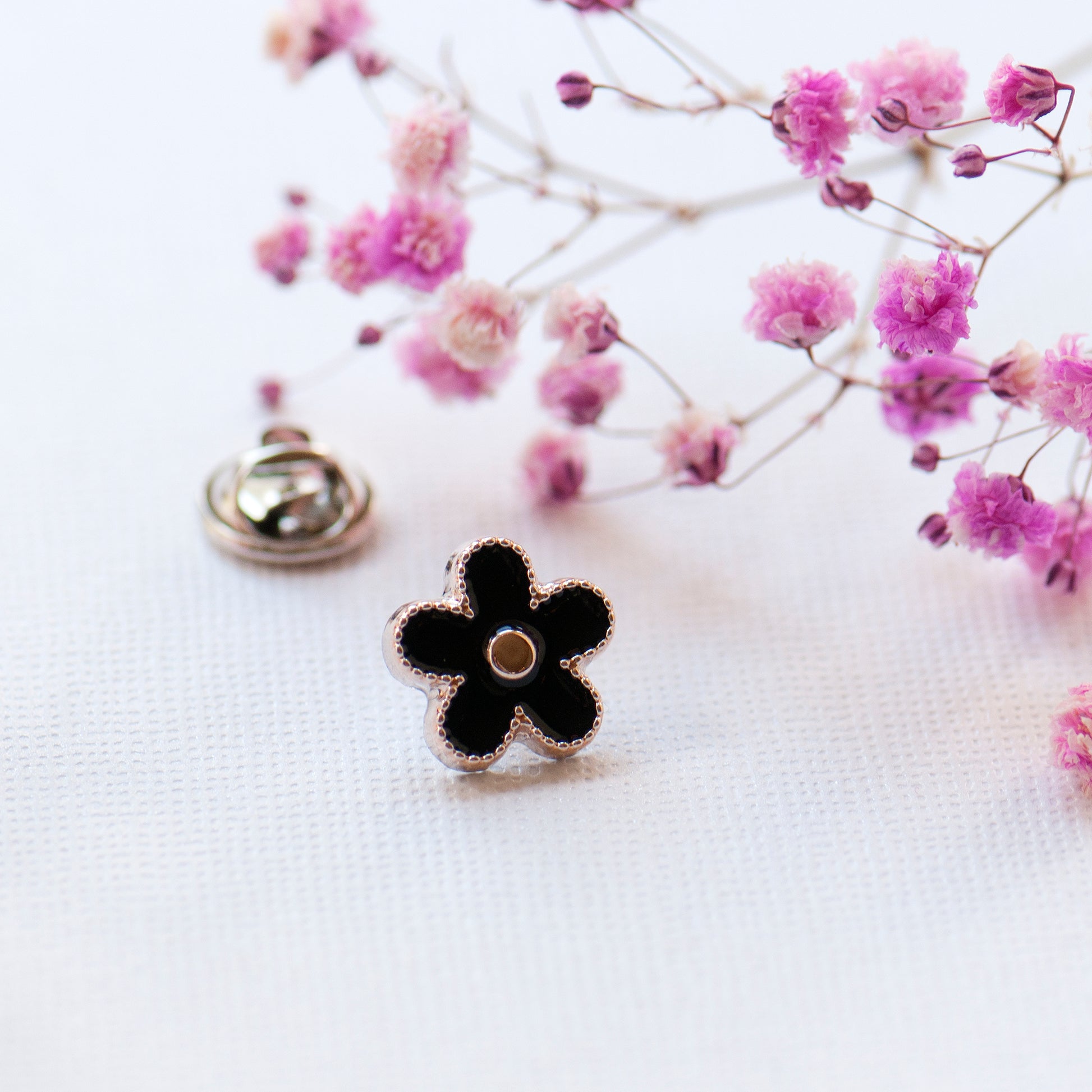 Black flower modesty pin 