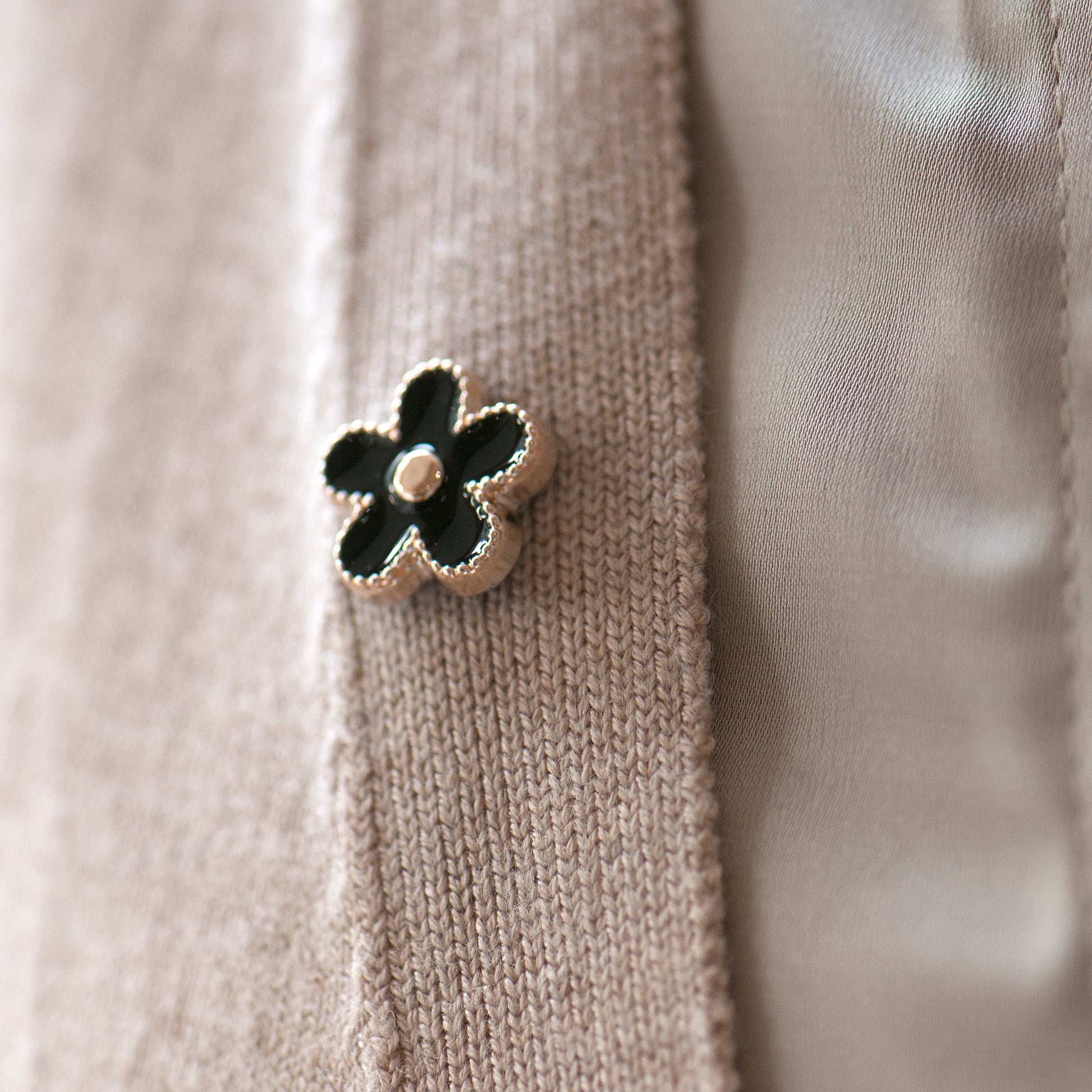 Black flower modesty pin or lapel pin