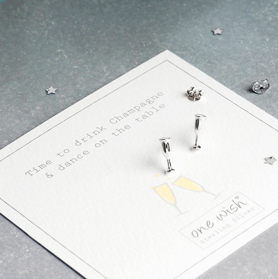 champagne flute stud earrings on a champagne quote gift card