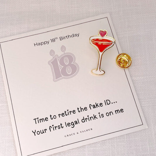 18th birthday card with a cocktail pin and humorous message on a light gray background