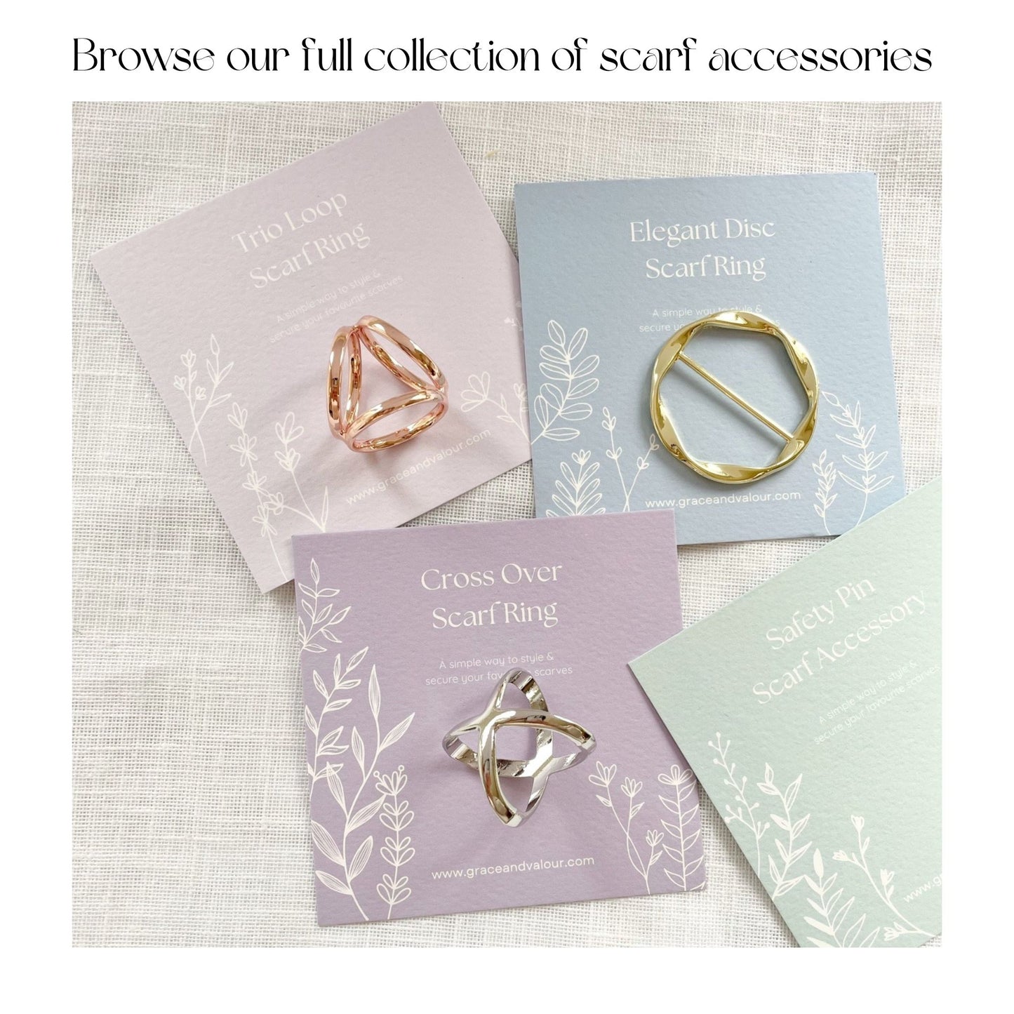 Collection of scarf rings on branded cards with a textured background