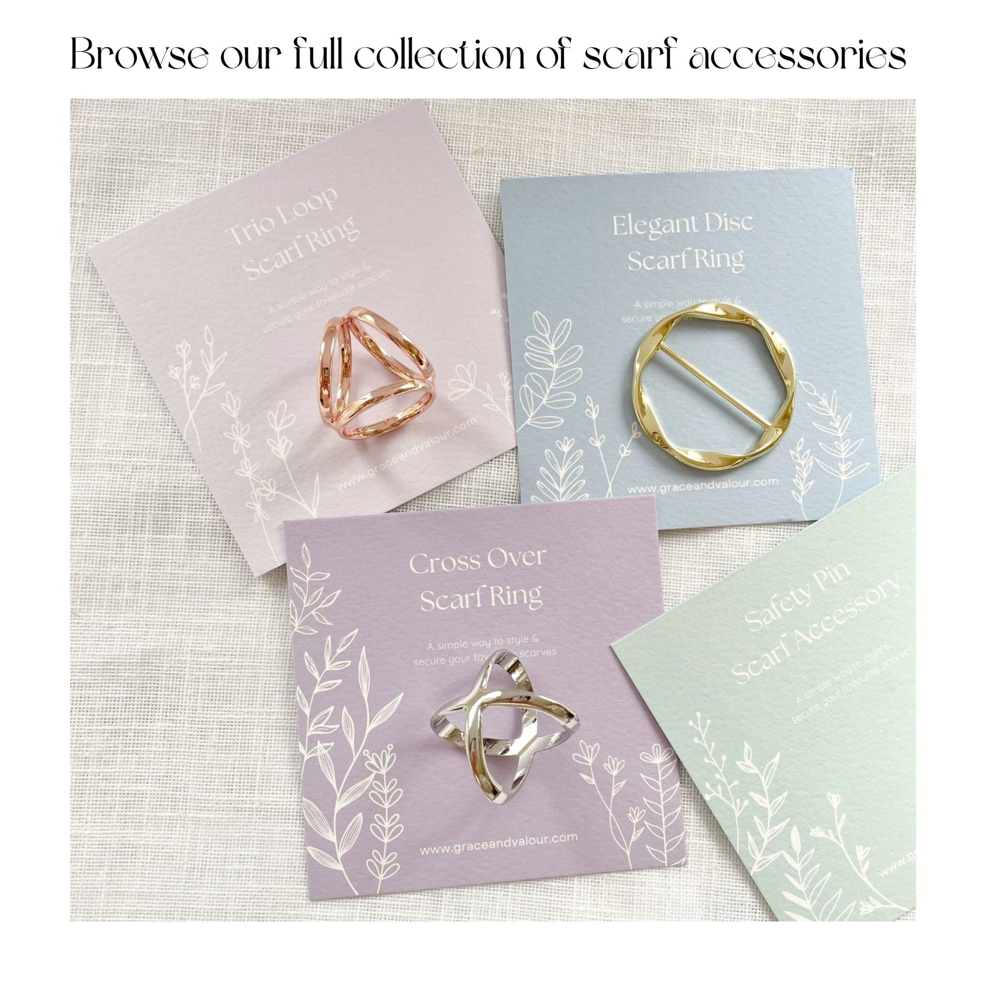 Collection of scarf rings on branded cards with a textured background
