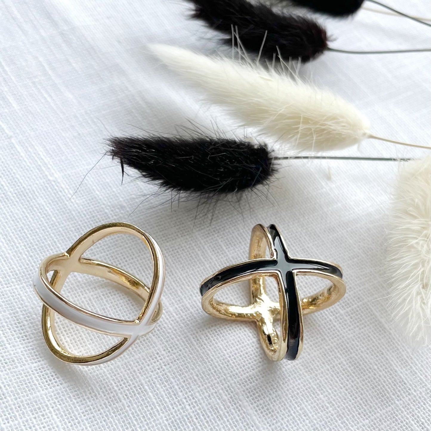 white or black and gold four way scarf rings