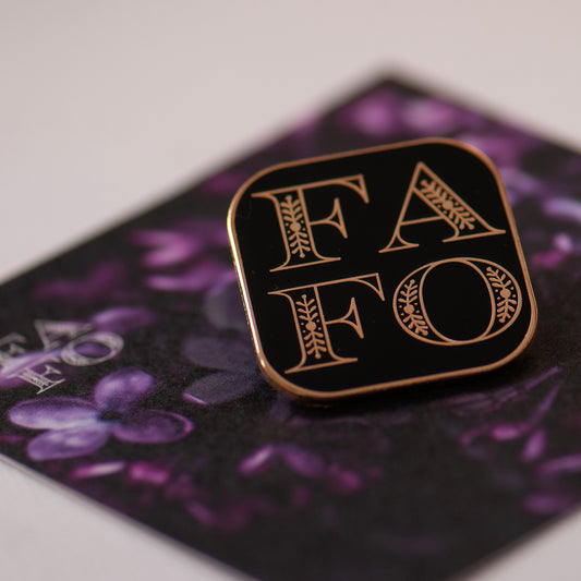 FAFO Black & Gold enamel pin on bespoke flower gift card, gifts under £10. F around and Find out pin gift, funny pin gift