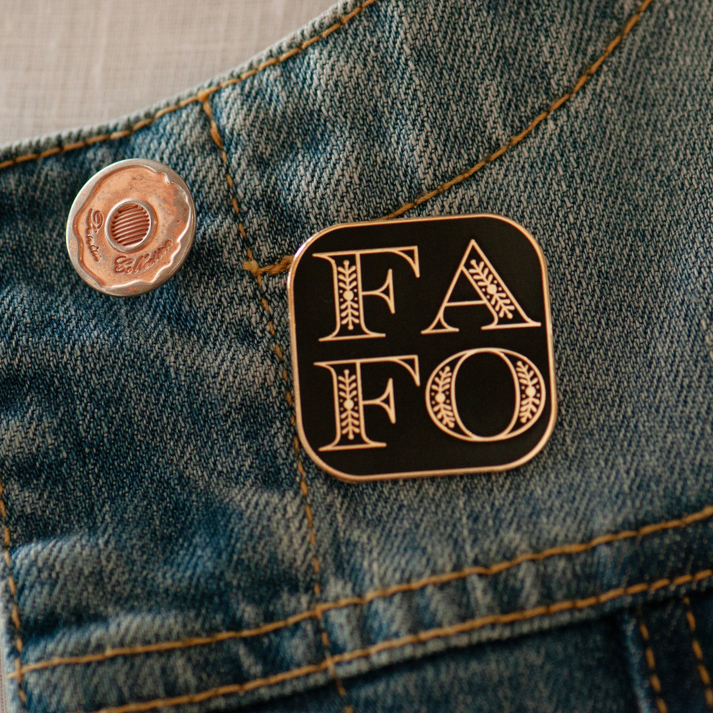 FAFO Black & Gold enamel pin on bespoke flower gift card, gifts under £10. F around and Find out pin gift, funny pin gift