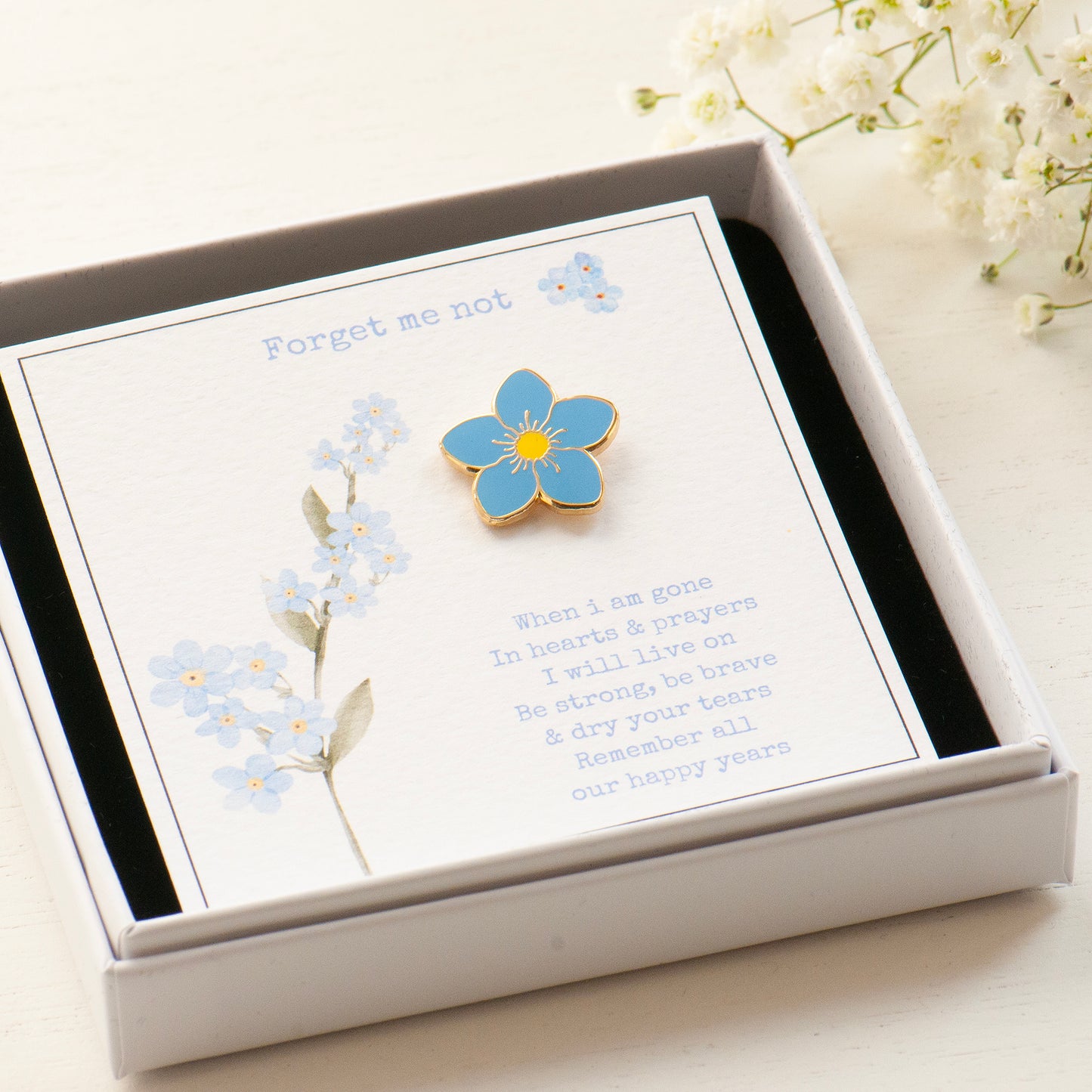 Forget me not enamel flower lapel remembrance pin in gift box, funeral keepsake, sympathy gift, grace and valour. &nbsp;&nbsp;
'When I am gone, in hearts &amp; prayers I will live on.&nbsp;
Be strong, be brave &amp; dry your tears. remember all our happy years'

These pins would be a thoughtful gift for a burial or memorial
