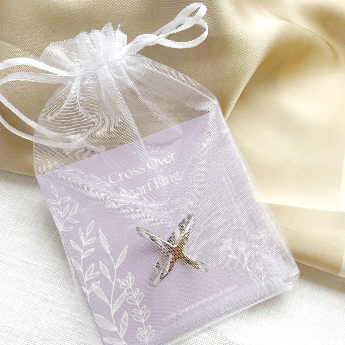 Silver scarf ring in a chiffon pouch packaging ready for gifting