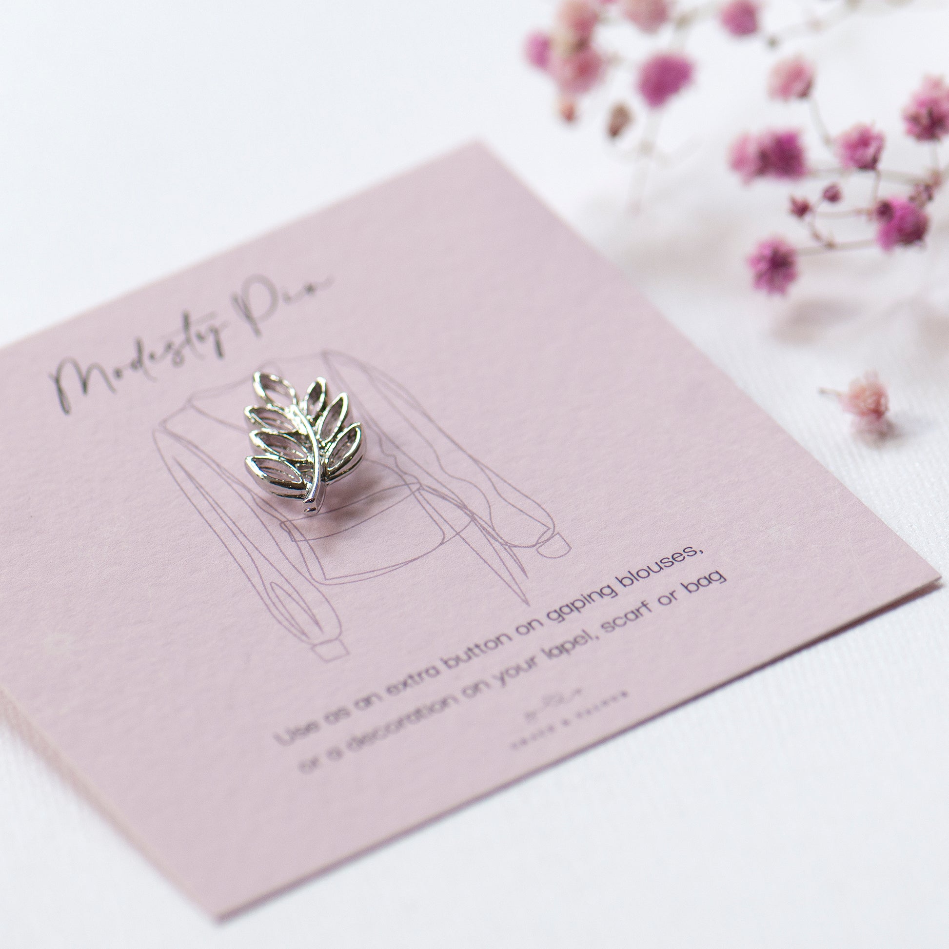 silver leaf modesty pin on bespoke gift card. Silver detailed growning leaf design modesty pin, nature lover gift, low top pin, cleavage pin, gift for her, gift for daughter, gift for friend