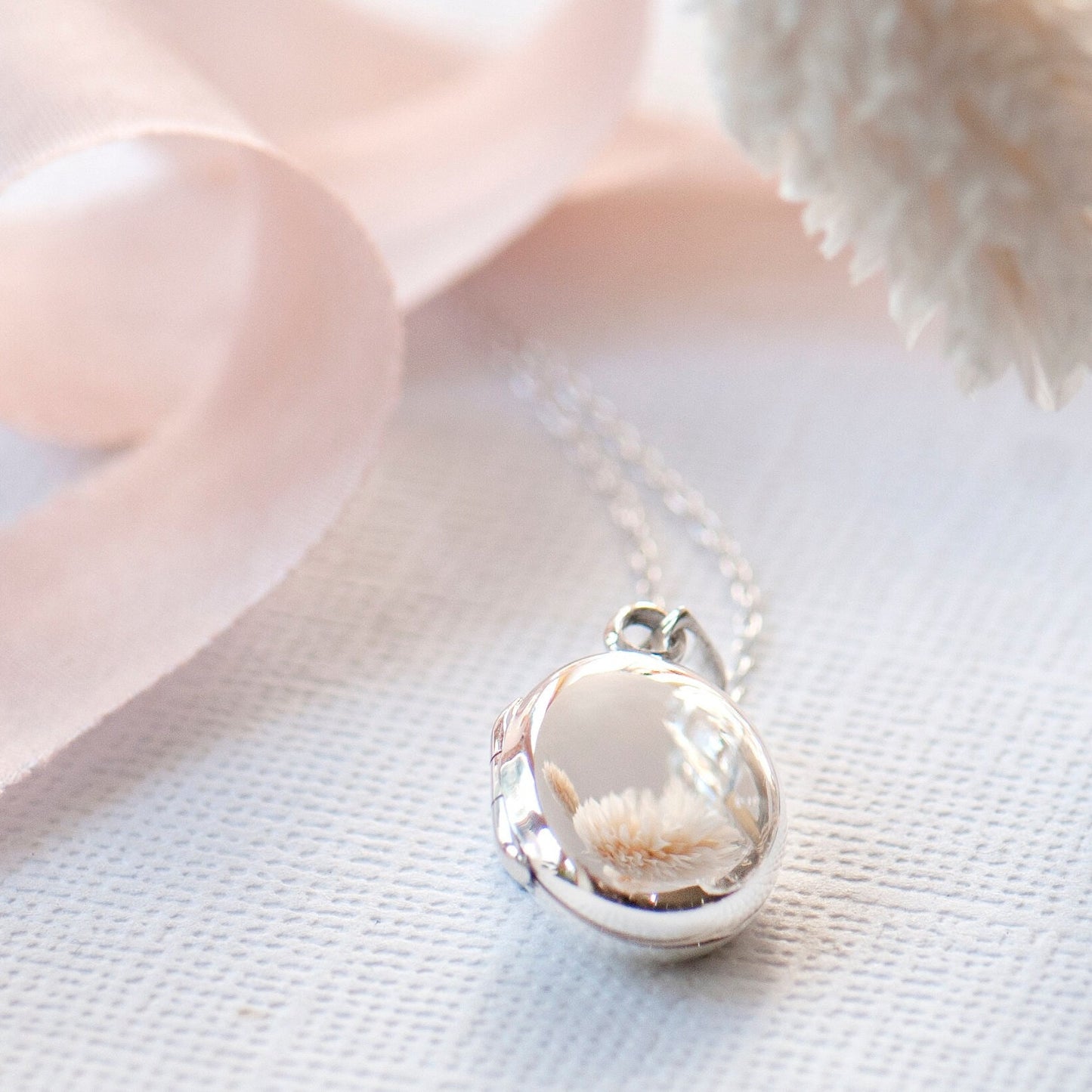 Little highly polished sterling silver oval necklace locket for girls or bridesmaids