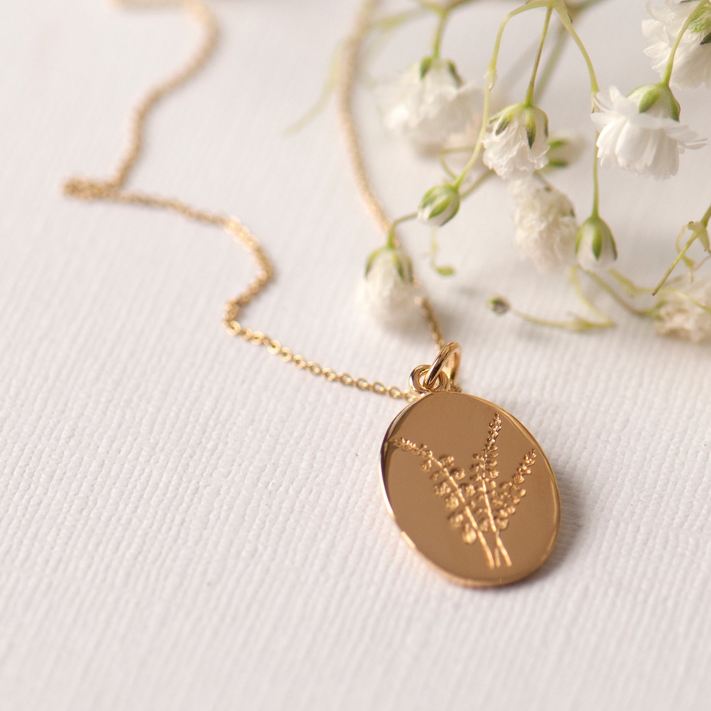 Heather engraved gold oval necklace, lucky heather flowers