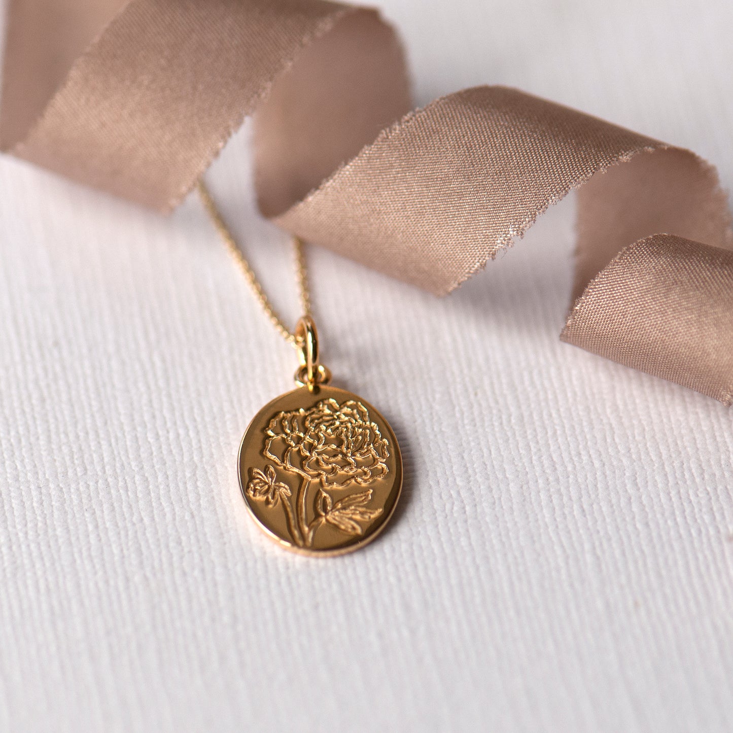 Engraved Peony gold oval pendant on a 17.5" dainty curb chain