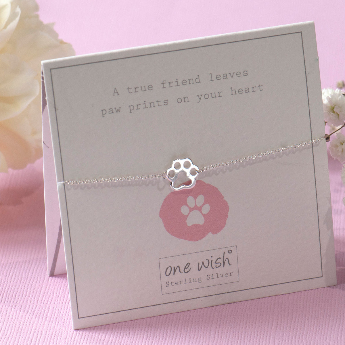 A true friend leaves paw prints on your heart sterling silver bracelet on gift card