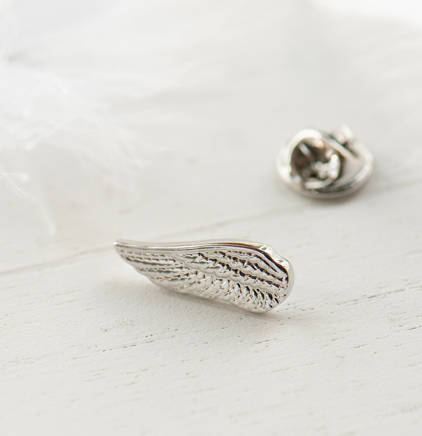 Silver angel wing memorial pin