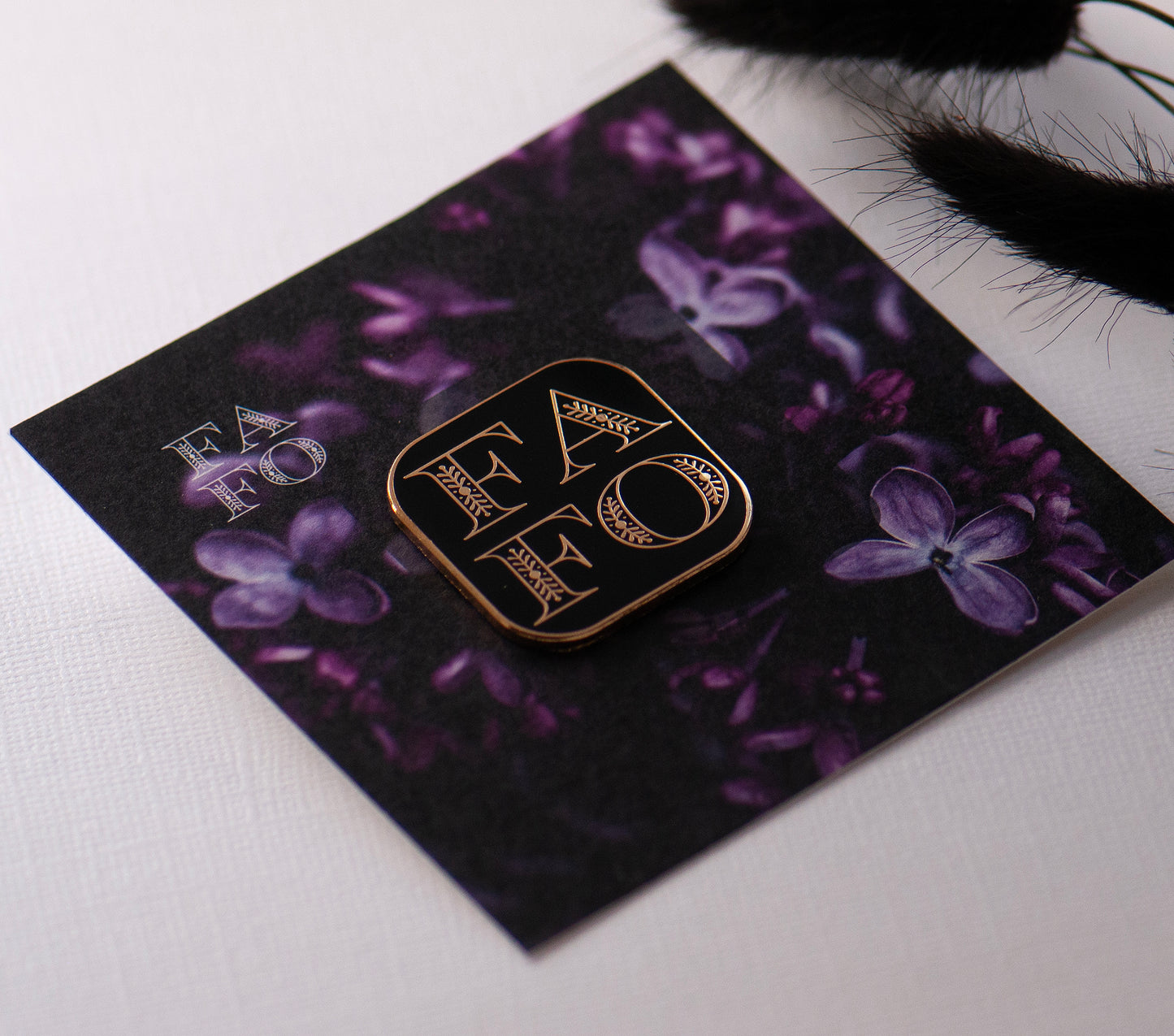 FAFO Black & Gold enamel pin on bespoke flower gift card, gifts under £10. F around and Find out pin gift, funny pin gift