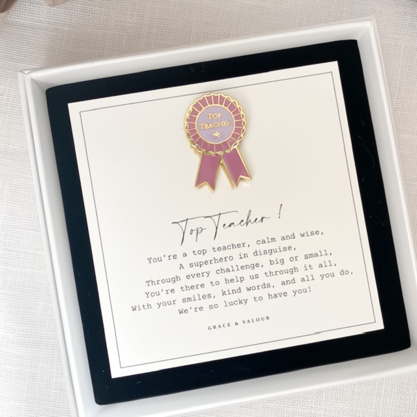 Pink Top Teacher enamel pin on a bespoke poem giftcard in a gift box ready for gifting.