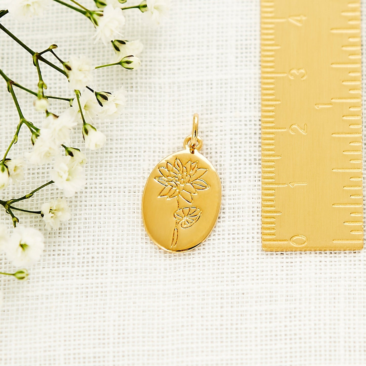 Waterlily July birth flower pendant, gold plated over sterling silver by Grace & Valour.