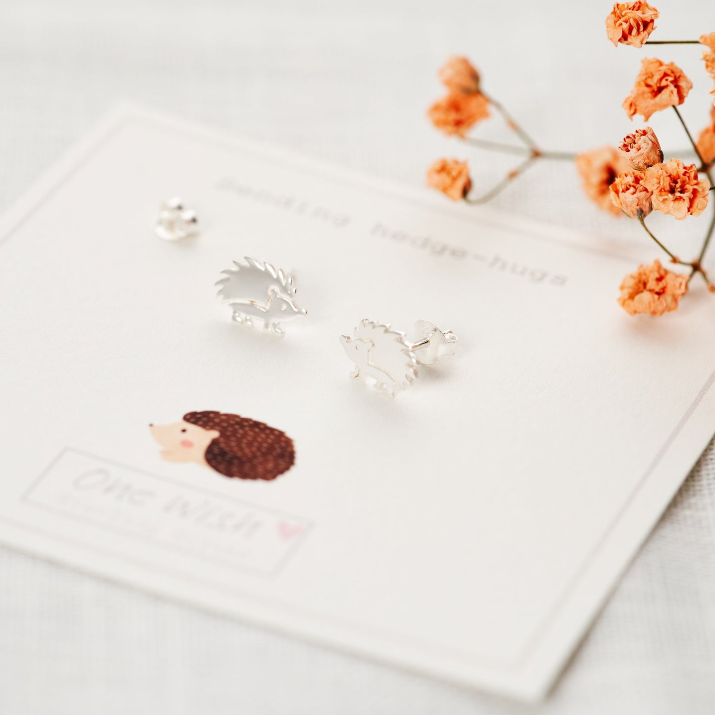 Woodland creatures,  little Hedgehog Sterling Silver Stud Earrings on Bespoke gift card which says 'Sending hedge-hugs'