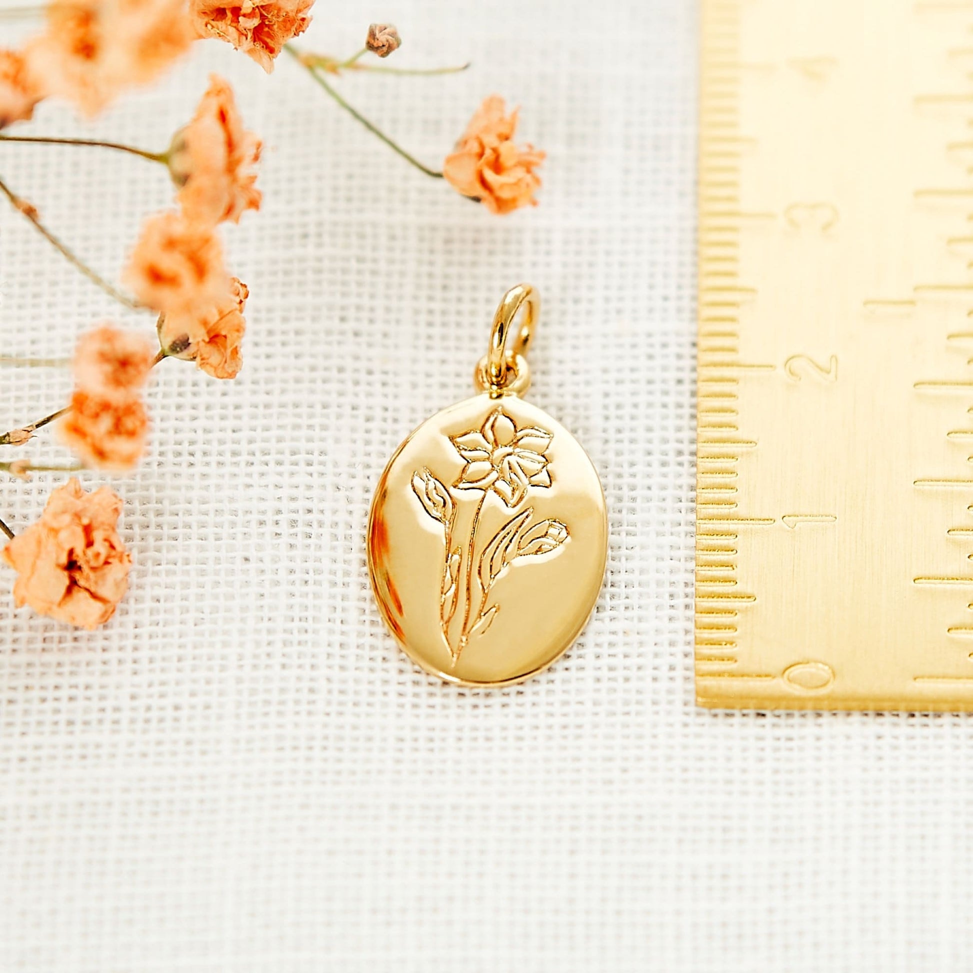 engraved March birthflower, beautiful cheerful daffodil gold necklace, made from sterling silver and gold plated to one micron. Can be personalised by adding engraving on the back.  Great gift for a march birthday girl, gift for mum, gift for mothers day, gift for her