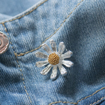 Tiny silver and gold daisy brooch on denim jacket pocket, mothers day gift, gift for her, flower brooch, gifts under £10